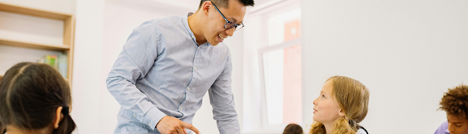 teacher talking to students